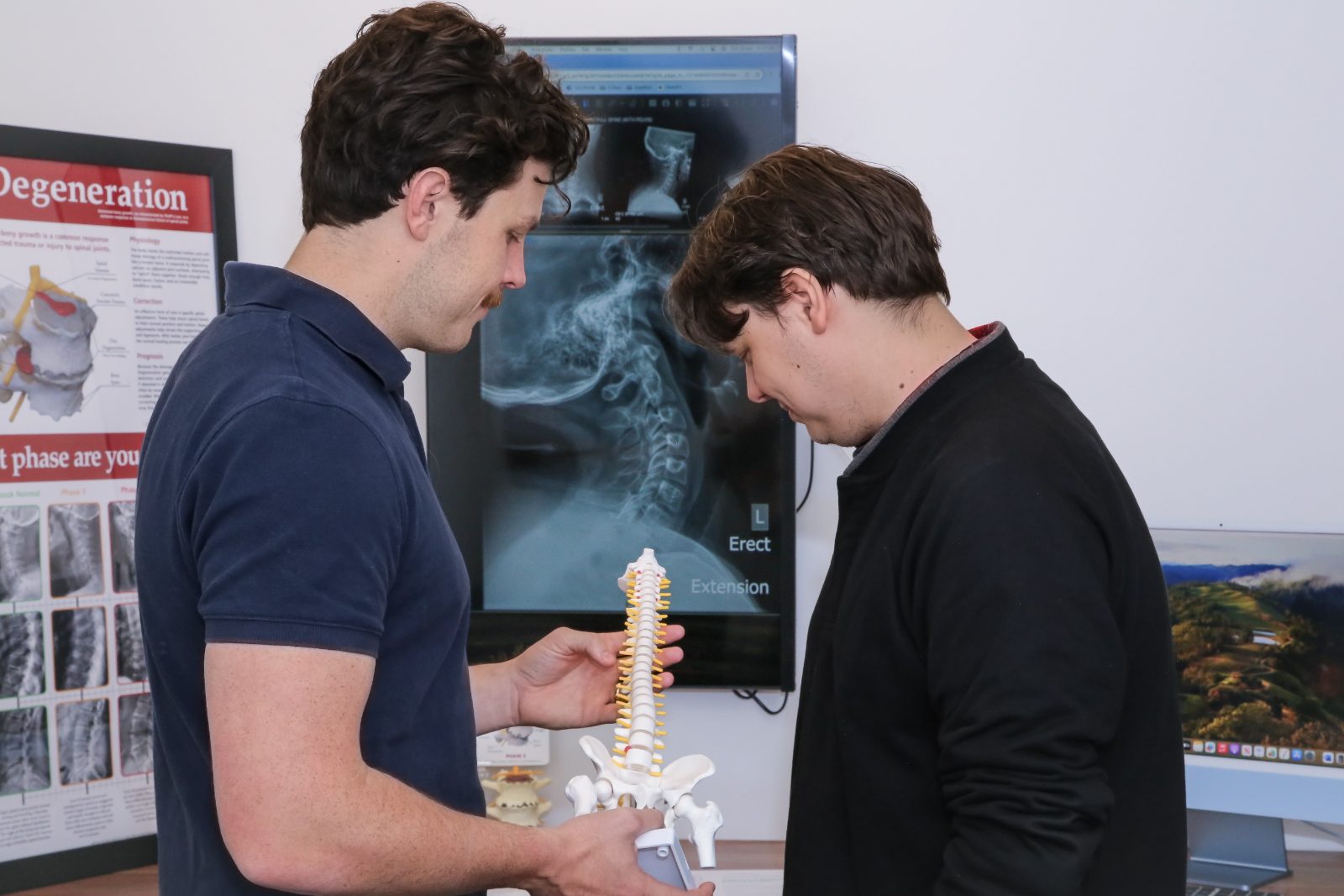 Lower back assessment and chiropractic adjustment with Dr Marcello
